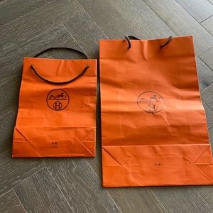 Hermès shopping bags x 2 one medium and one small